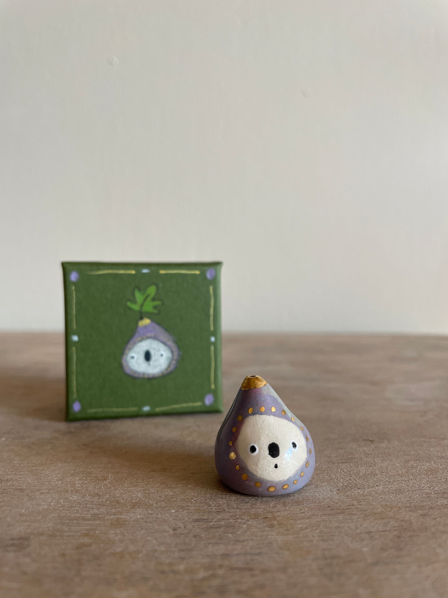 Mini figue faïence et or