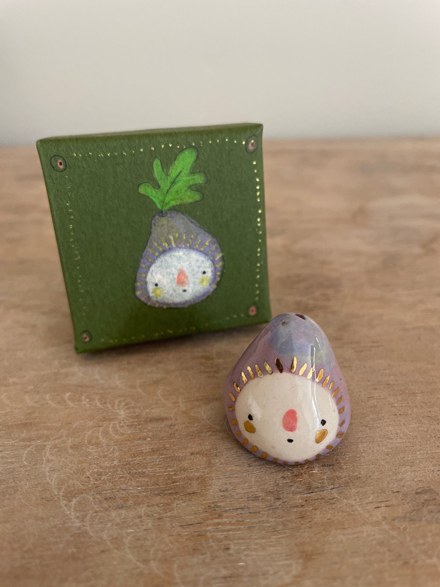 Mini figue faïence et or