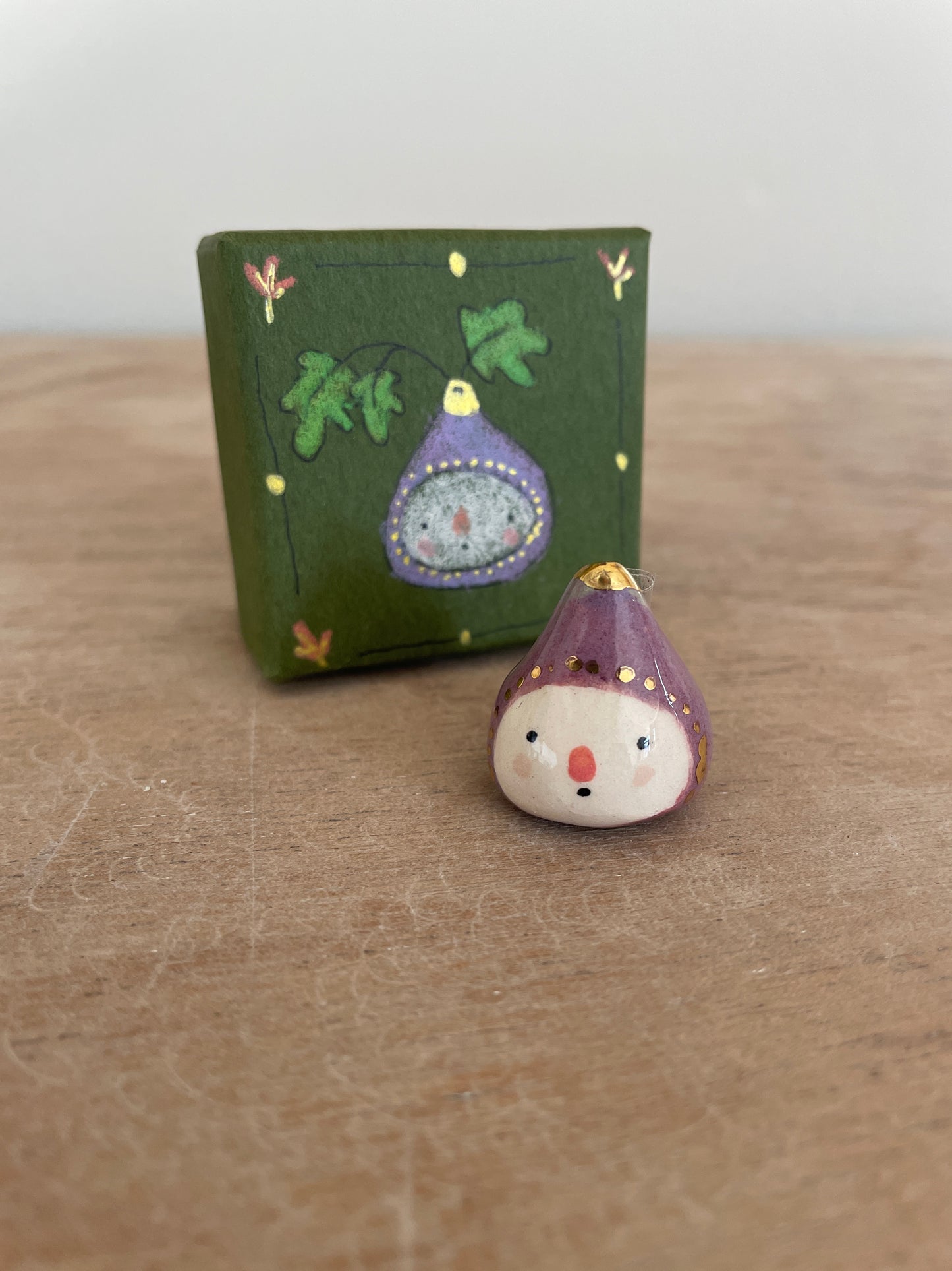 Mini figue faïence et or