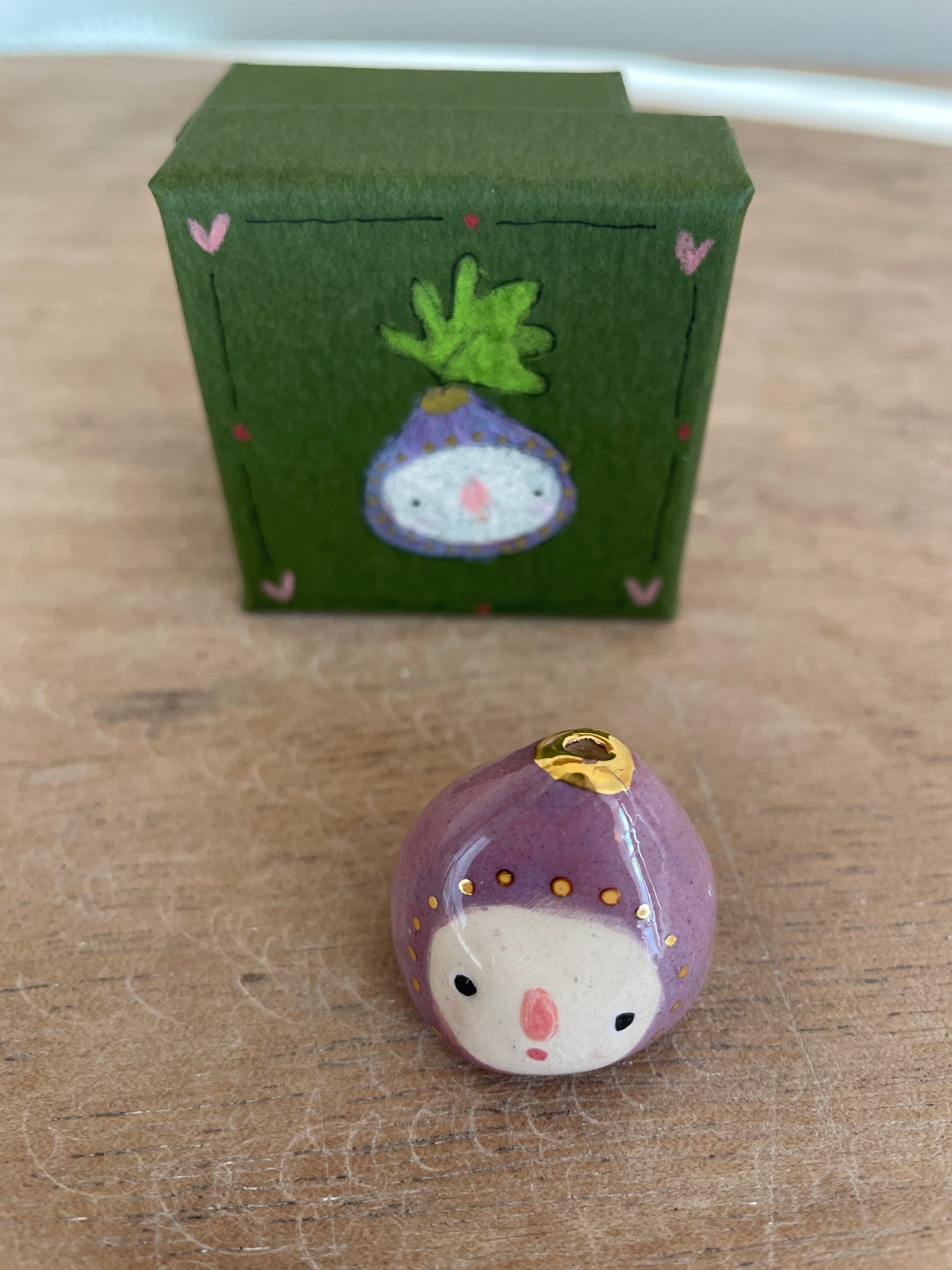 Mini figue faïence et or