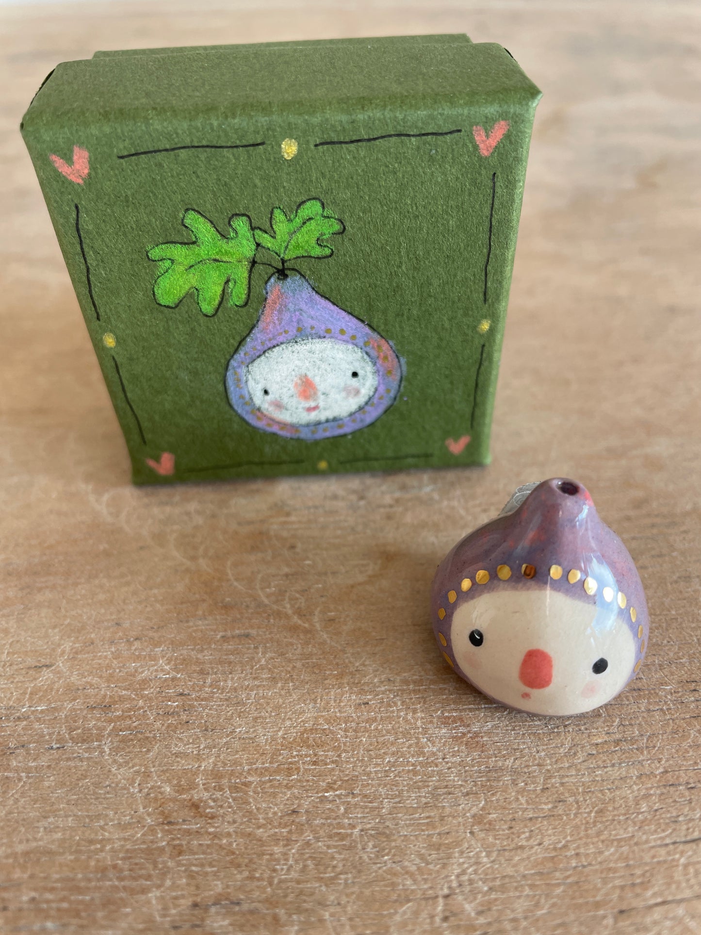 Mini figue faïence et or