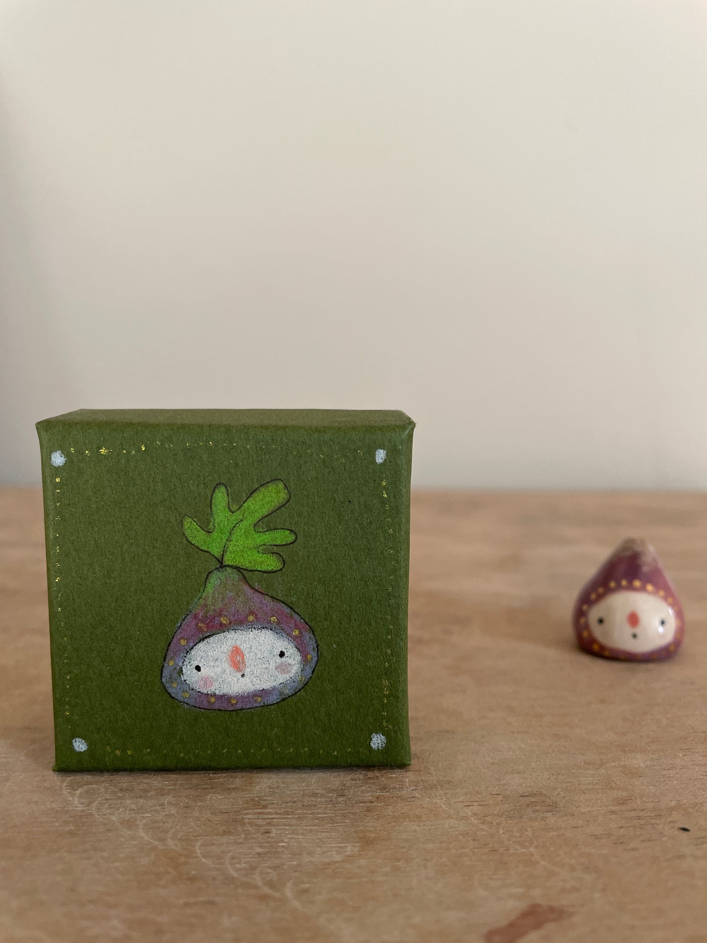 Mini figue faïence et or