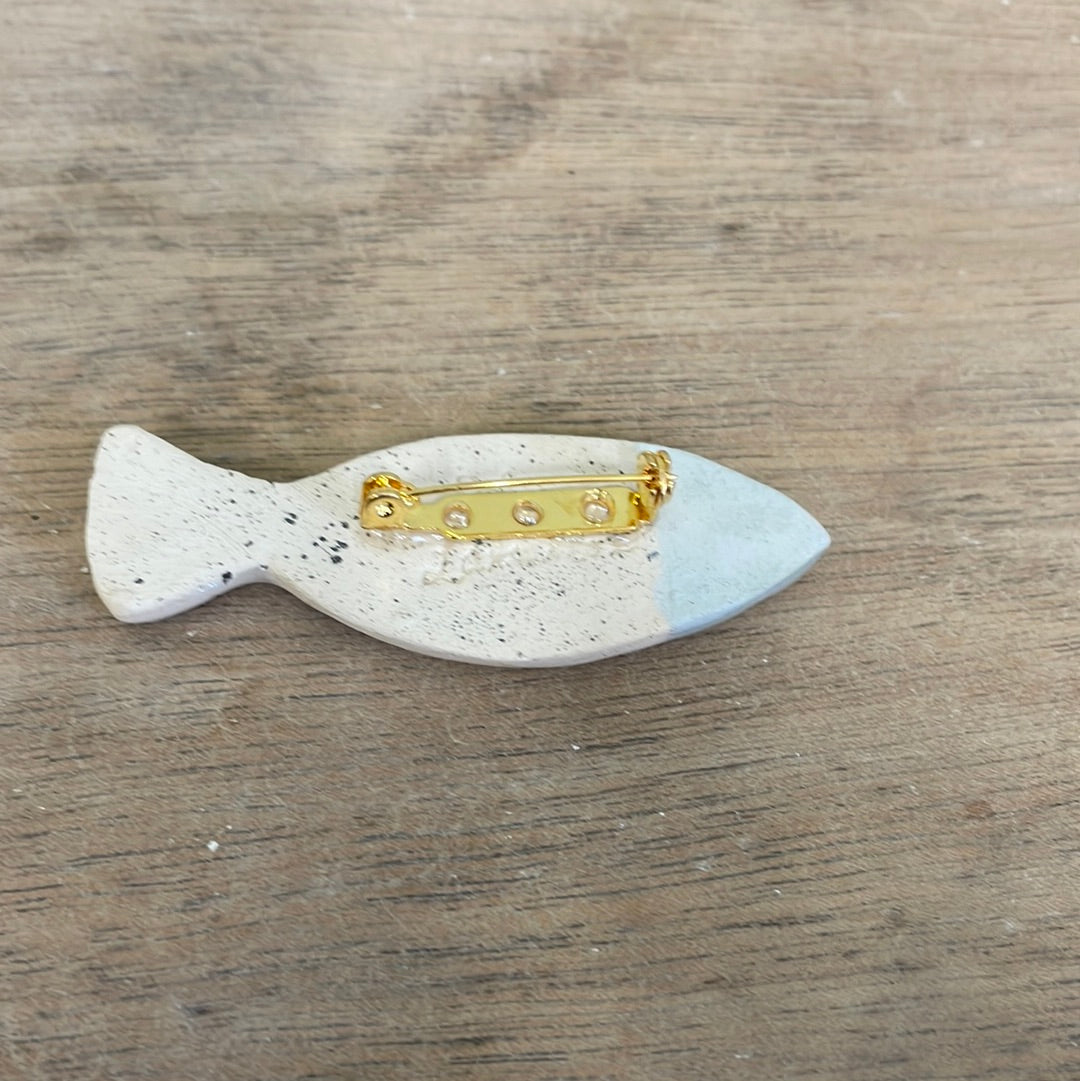 Enamelled ceramic blue fish brooch