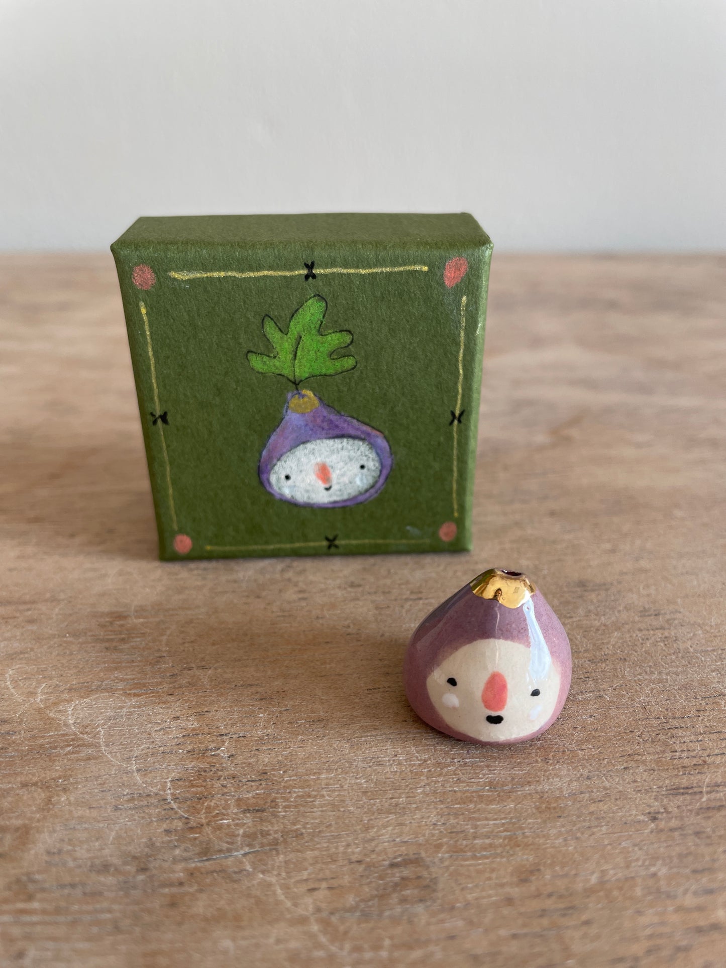 Mini figue faïence et or