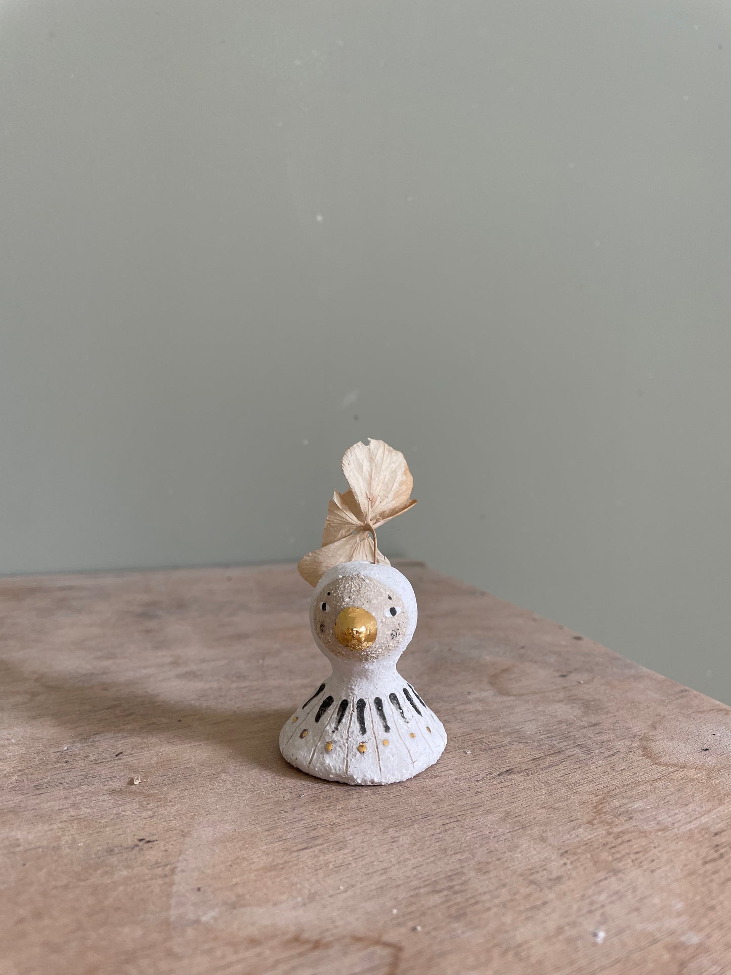 Mini buste oiseau en grès et or